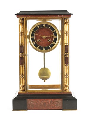 Lot A LATE 19TH CENTURY FRENCH ORMOLU, BLACK AND ROUGE MARBLE MANTEL CLOCK