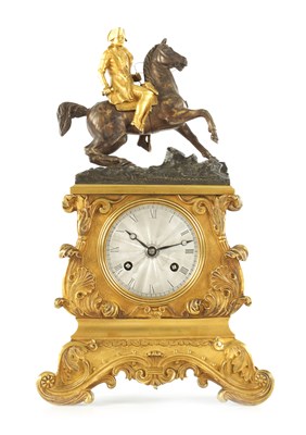 Lot A SMALL EARLY 19TH CENTURY FRENCH ORMOLU AND BRONZE FIGURAL MANTEL CLOCK