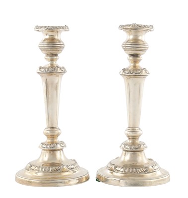 Lot A PAIR OF REGENCY SILVER CANDLESTICKS