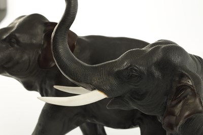 Lot 47 - A PAIR OF JAPANESE MEIJI PERIOD PATINATED BRONZE SCULPTURES