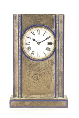 Lot A CONTINENTAL ART DECO SILVER AND ENAMEL DESK CLOCK