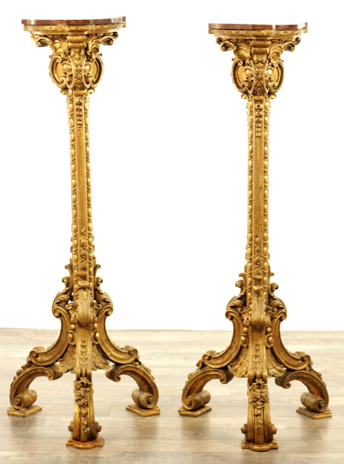 Lot 1178 - A PAIR OF 19TH CENTURY GILT WOOD CHIPPENDALE STYLE TORCHERES