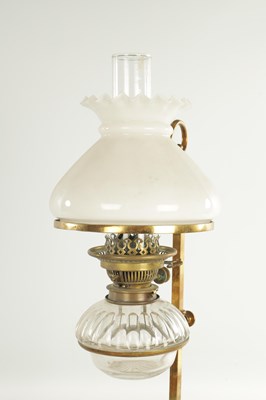 Lot 511 - AN ART NOVEAU BRASS ADJUSTABLE STUDENTS LAMP