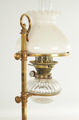 Lot 511 - AN ART NOVEAU BRASS ADJUSTABLE STUDENTS LAMP