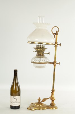 Lot 511 - AN ART NOVEAU BRASS ADJUSTABLE STUDENTS LAMP