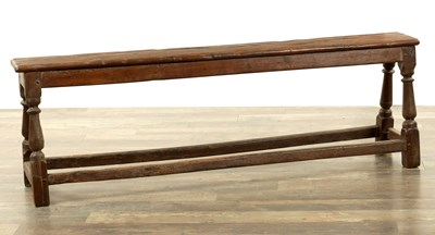 Lot 79 - A 17TH CENTURY STYLE JOINED OAK BENCH / LONG STOOL