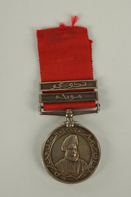 Lot 490 - A 1896 SULTAN OF ZANZIBAR'S MEDAL WITH TWO CLASPS ON CRIMSON RIBBON