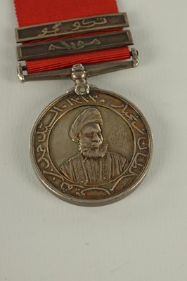 Lot 490 - A 1896 SULTAN OF ZANZIBAR'S MEDAL WITH TWO CLASPS ON CRIMSON RIBBON