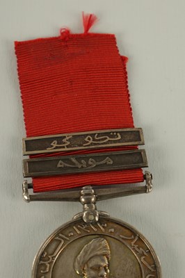 Lot 490 - A 1896 SULTAN OF ZANZIBAR'S MEDAL WITH TWO CLASPS ON CRIMSON RIBBON
