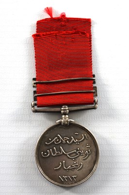 Lot 490 - A 1896 SULTAN OF ZANZIBAR'S MEDAL WITH TWO CLASPS ON CRIMSON RIBBON