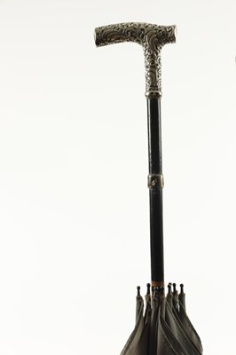 Lot 820 - TWO 19TH CENTURY SILVER MOUNTED PARASOLS