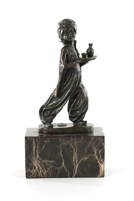 Lot 635 - A BRONZE FIGURE OF AN EASTERN SERVING BOY AFTER FERDINAND PREISS