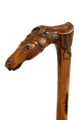 Lot 792 - A 19TH CENTURY FRUITWOOD EQUESTRIAN HANDLED WALKING STICK