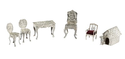 Lot A COLLECTION OF CONTINENTAL SILVER MINIATURE FURNITURE