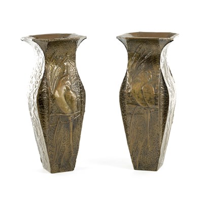 Lot 606 - A PAIR OF EARLY 20TH CENTURY PRESSED BRONZE VASES