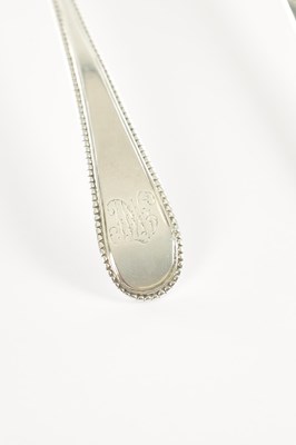 Lot 189 - THREE GEORGIAN SILVER TABLE SPOONS, ONE CONTINENTAL TABLE SPOON, A SILVER PLATED BASTING SPOON, FISH SLICE AND SOUP LADLE