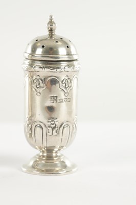 Lot 4 - A PAIR OF SMALL SILVER TOAST RACKS TOGETHER WITH A PAIR OF SILVER PEPPERETTES