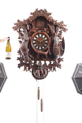 Lot 1027 - A LARGE LATE 19TH CENTURY MUSICAL BLACK FOREST CUCKOO WALL CLOCK