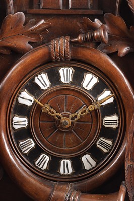 Lot 1027 - A LARGE LATE 19TH CENTURY MUSICAL BLACK FOREST CUCKOO WALL CLOCK