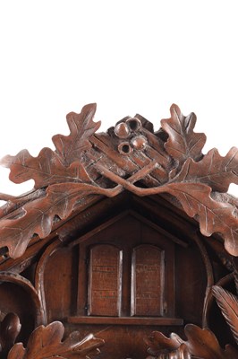 Lot 1027 - A LARGE LATE 19TH CENTURY MUSICAL BLACK FOREST CUCKOO WALL CLOCK