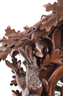 Lot 1027 - A LARGE LATE 19TH CENTURY MUSICAL BLACK FOREST CUCKOO WALL CLOCK