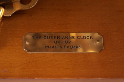 Lot 1055 - COMMITTI, LONDON. A LATE 20TH CENTURY "QUEEN ANNE" QUARTER CHIMING BURR WALNUT BRACKET CLOCK