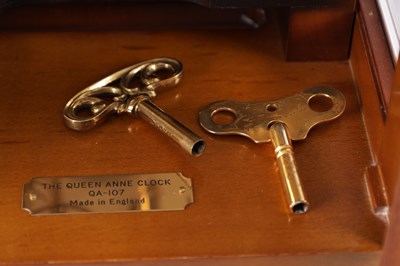Lot 1055 - COMMITTI, LONDON. A LATE 20TH CENTURY "QUEEN ANNE" QUARTER CHIMING BURR WALNUT BRACKET CLOCK