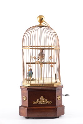 Lot 537 - A LATE 19TH CENTURY COIN-OPERATED WALNUT CASED SINGING BIRD AUTOMATON