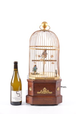 Lot 537 - A LATE 19TH CENTURY COIN-OPERATED WALNUT CASED SINGING BIRD AUTOMATON