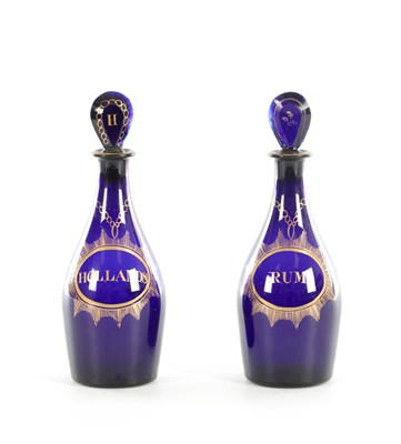 Lot 66 - A PAIR OF 19TH CENTURY GEORGIAN BRISTOL BLUE GLASS DECANTERS