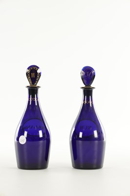 Lot 66 - A PAIR OF 19TH CENTURY GEORGIAN BRISTOL BLUE GLASS DECANTERS