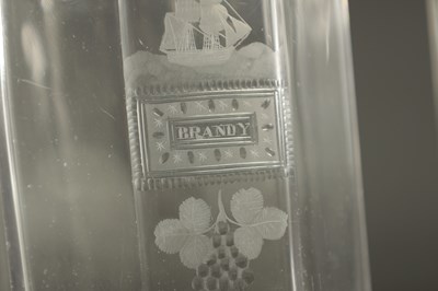 Lot 373 - A SET OF THREE GEORGIAN CUT GLASS DECANTERS