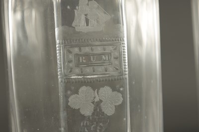 Lot 373 - A SET OF THREE GEORGIAN CUT GLASS DECANTERS