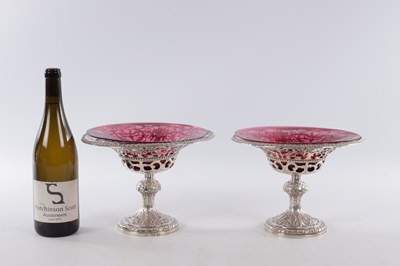 Lot 458 - JOHN SAMUEL HUNT, LONDON. A PAIR OF VICTORIAN SILVER AND RUBY GLASS TAZZAS