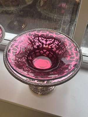Lot 458 - JOHN SAMUEL HUNT, LONDON. A PAIR OF VICTORIAN SILVER AND RUBY GLASS TAZZAS