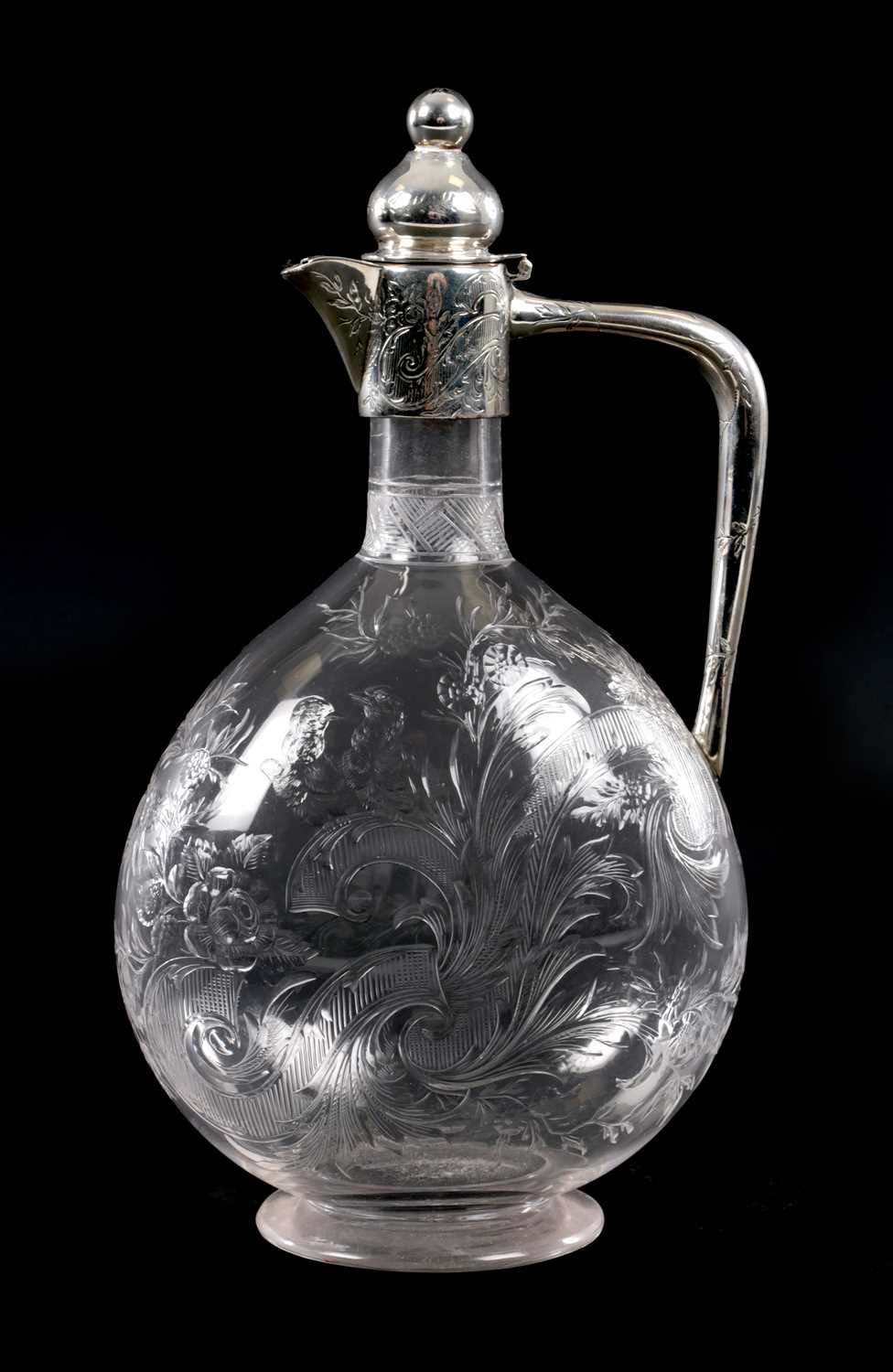 Lot 452 - SPURRIER & CO, BIRMINGHAM. A SILVER MOUNTED CUT GLASS CLARET JUG