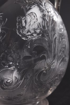 Lot 452 - SPURRIER & CO, BIRMINGHAM. A SILVER MOUNTED CUT GLASS CLARET JUG
