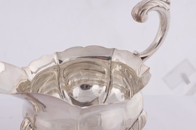Lot 395 - JOHN POLLOCK, LONDON. A PAIR OF GEORGE III SILVER GRAVY BOATS