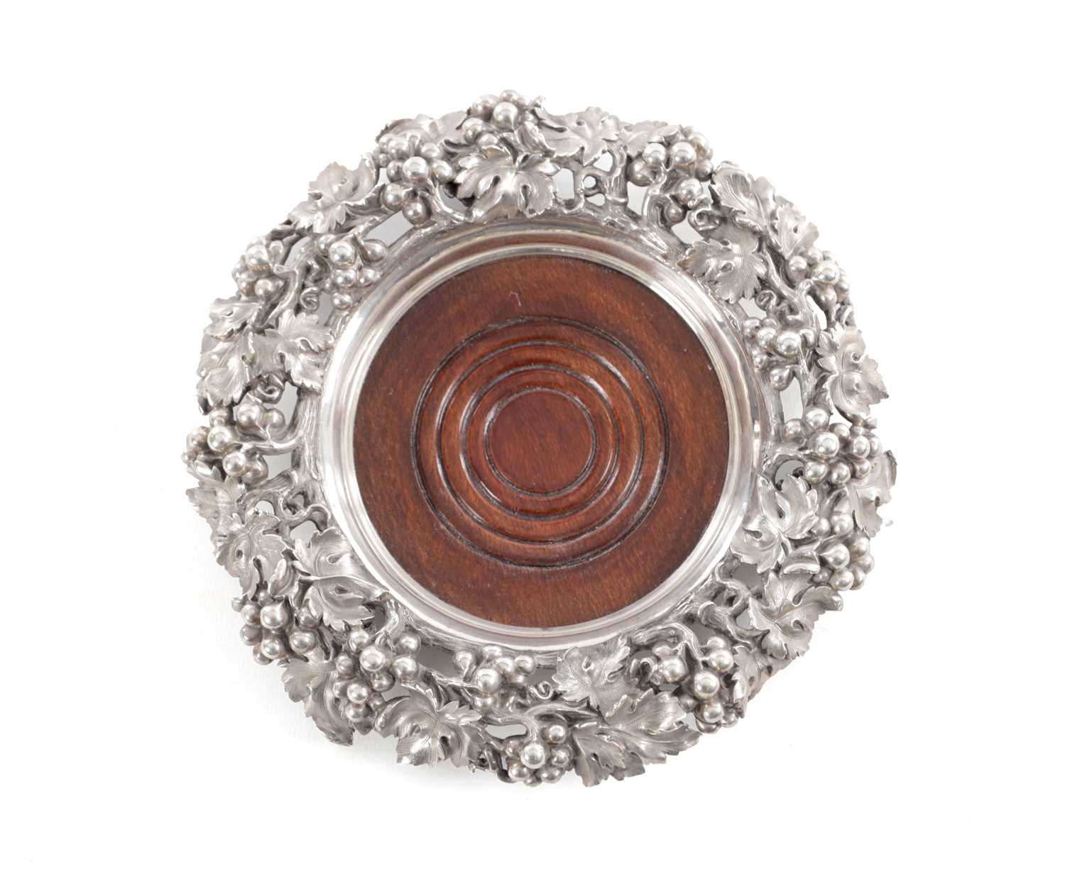 Lot 385 - MORTIMER & HUNT, LONDON. A VICTORIAN MAHOGANY AND SILVER BOTTLE COASTER