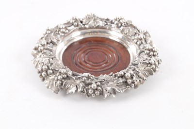 Lot 385 - MORTIMER & HUNT, LONDON. A VICTORIAN MAHOGANY AND SILVER BOTTLE COASTER