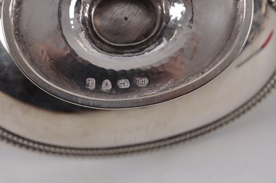 Lot 377 - ROBERT HENNELL. LONDON. A PAIR OF GEORGE III SILVER SAUCE TUREENS AND COVERS