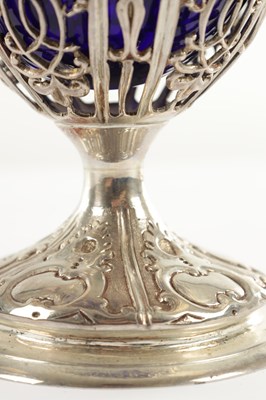 Lot 375 - A LATE 18TH/19TH STERLING SILVER AND BLUE GLASS SUGAR BOWL
