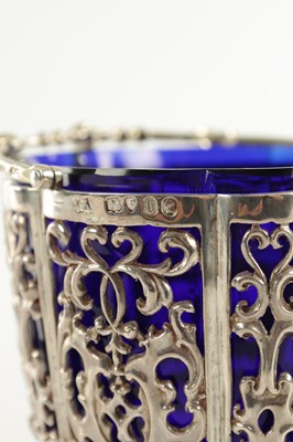 Lot 375 - A LATE 18TH/19TH STERLING SILVER AND BLUE GLASS SUGAR BOWL