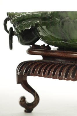 Lot A PAIR OF LATE QING DYNASTY CHINESE JADE DISHES ON STANDS