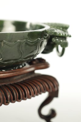 Lot A PAIR OF LATE QING DYNASTY CHINESE JADE DISHES ON STANDS