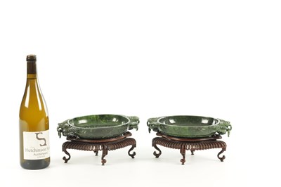 Lot A PAIR OF LATE QING DYNASTY CHINESE JADE DISHES ON STANDS