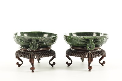 Lot A PAIR OF LATE QING DYNASTY CHINESE JADE DISHES ON STANDS