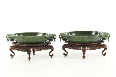 Lot A PAIR OF LATE QING DYNASTY CHINESE JADE DISHES ON STANDS