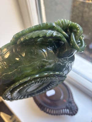 Lot 138 - A PAIR OF LATE QING DYNASTY CHINESE JADE DISHES ON STANDS