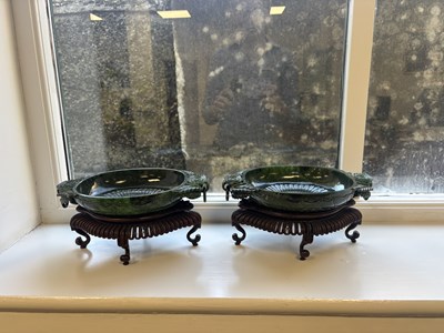 Lot 138 - A PAIR OF LATE QING DYNASTY CHINESE JADE DISHES ON STANDS